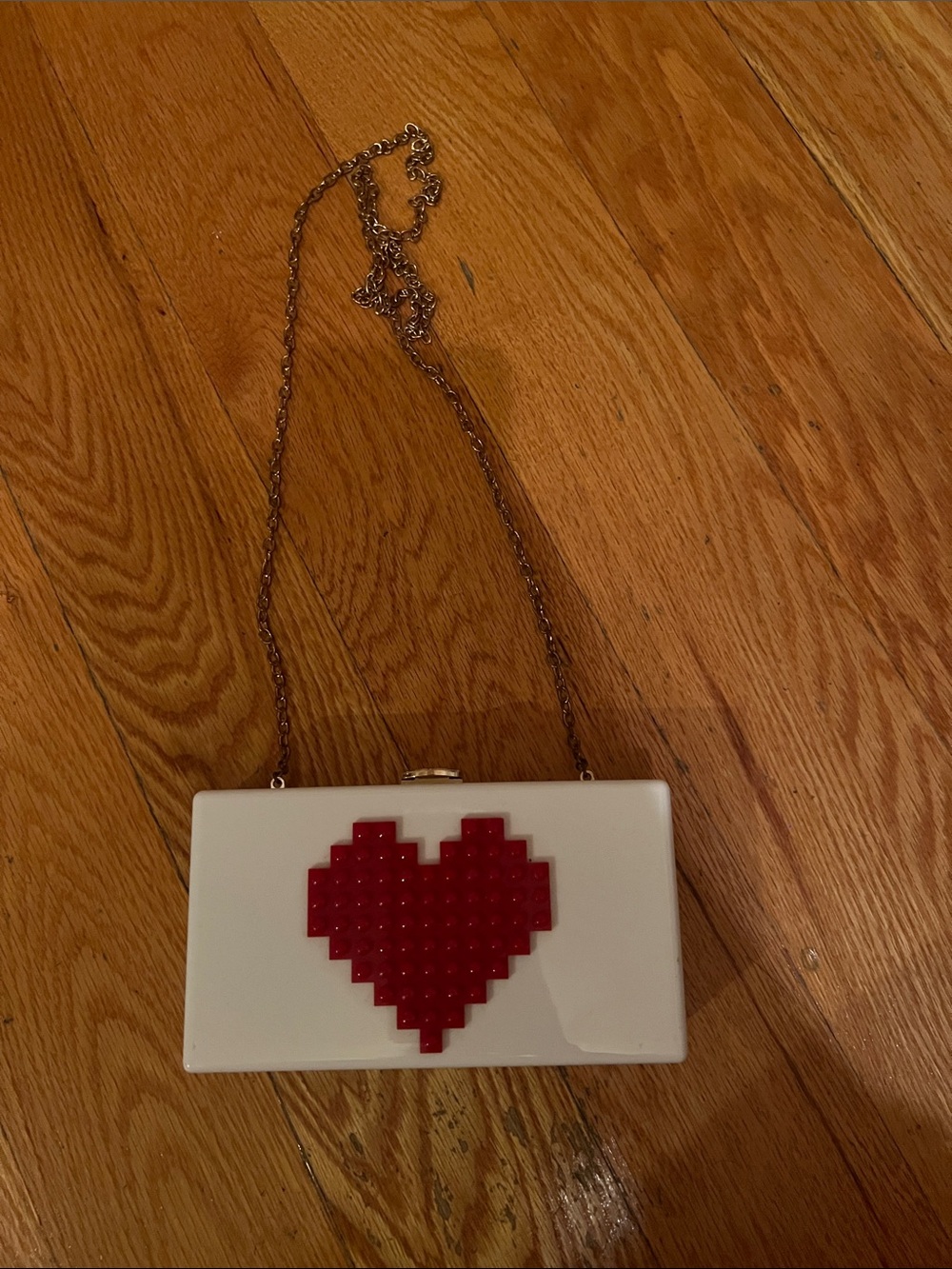 Chloe K White Box Clutch with Red Pixel Heart and Gold Chain Strap